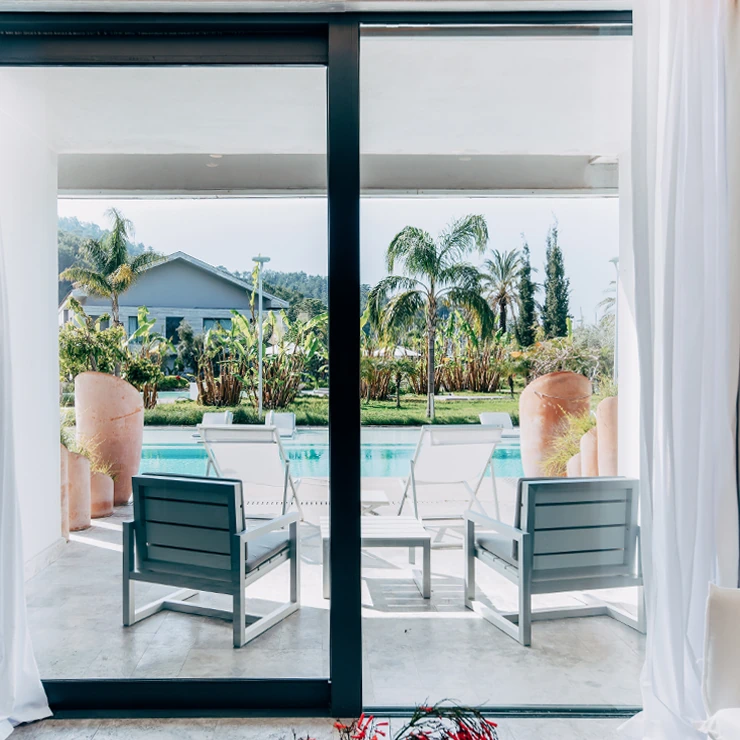 Deluxe Room with pool connection at D Resort Gocek featuring canopy bed and pool access