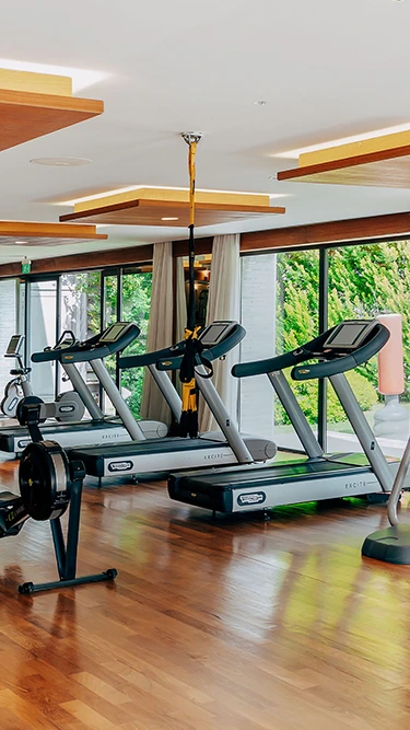 Gym at D Resort Gocek with a warm wood-toned fitness area