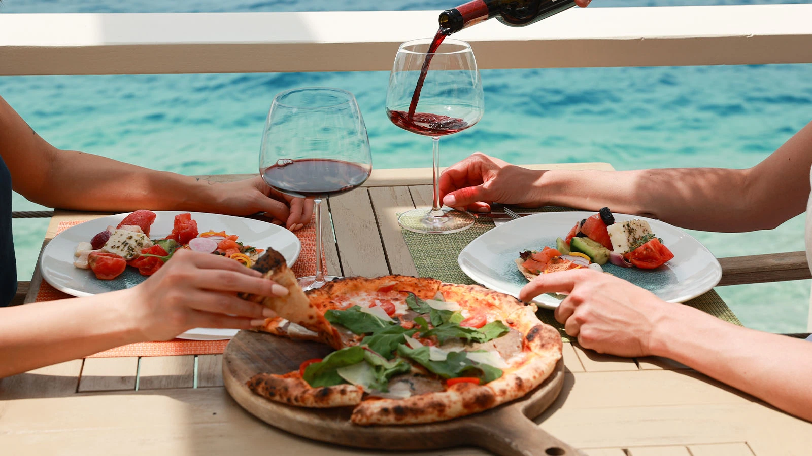 Pizza and wine at D-Breeze, D Resort Gocek, by the turquoise sea