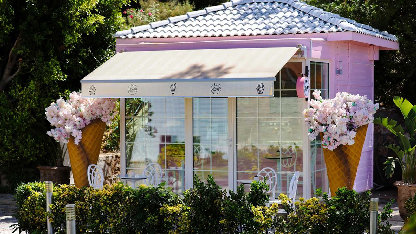 DD Scoop pink ice cream kiosk at D Resort Gocek with giant cone planters