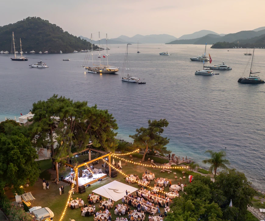 Garden wedding setup at D Resort Gocek with an elegant table and lights
